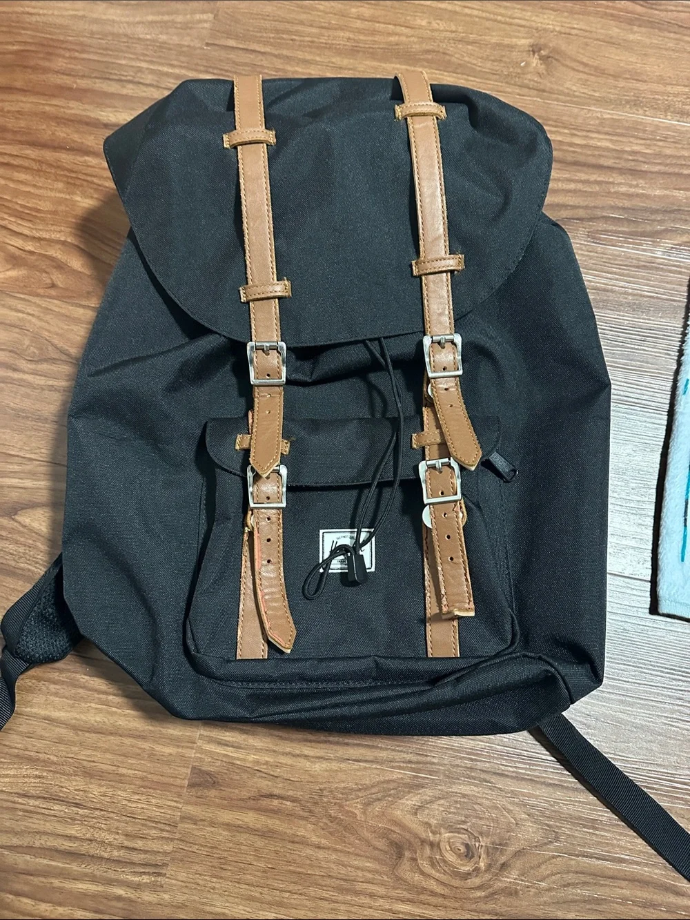 Herschel Black and Tan Canvas Backpack with Buckle Straps